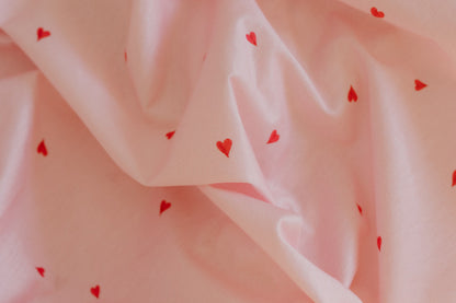 Darling Heart fitted sheet, soft pink organic cotton with red hearts